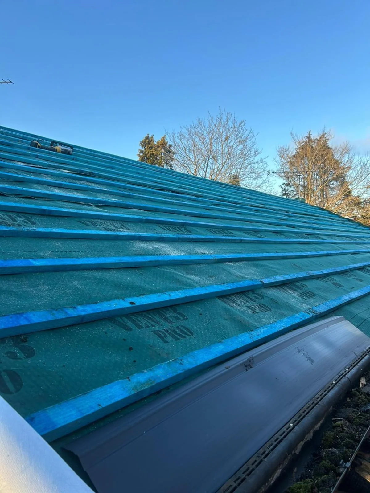 breathable roofing membrane and blue-treated timber battens fitted on a residential roof in Ash — Mitchell's Roofing